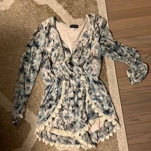 Blue black and white multicolored long-sleeve romper from ASTR